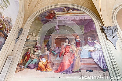 Fresco in inner courtyard of the Basilica della Santissima Annunziata in Florence, Italy Editorial Stock Photo